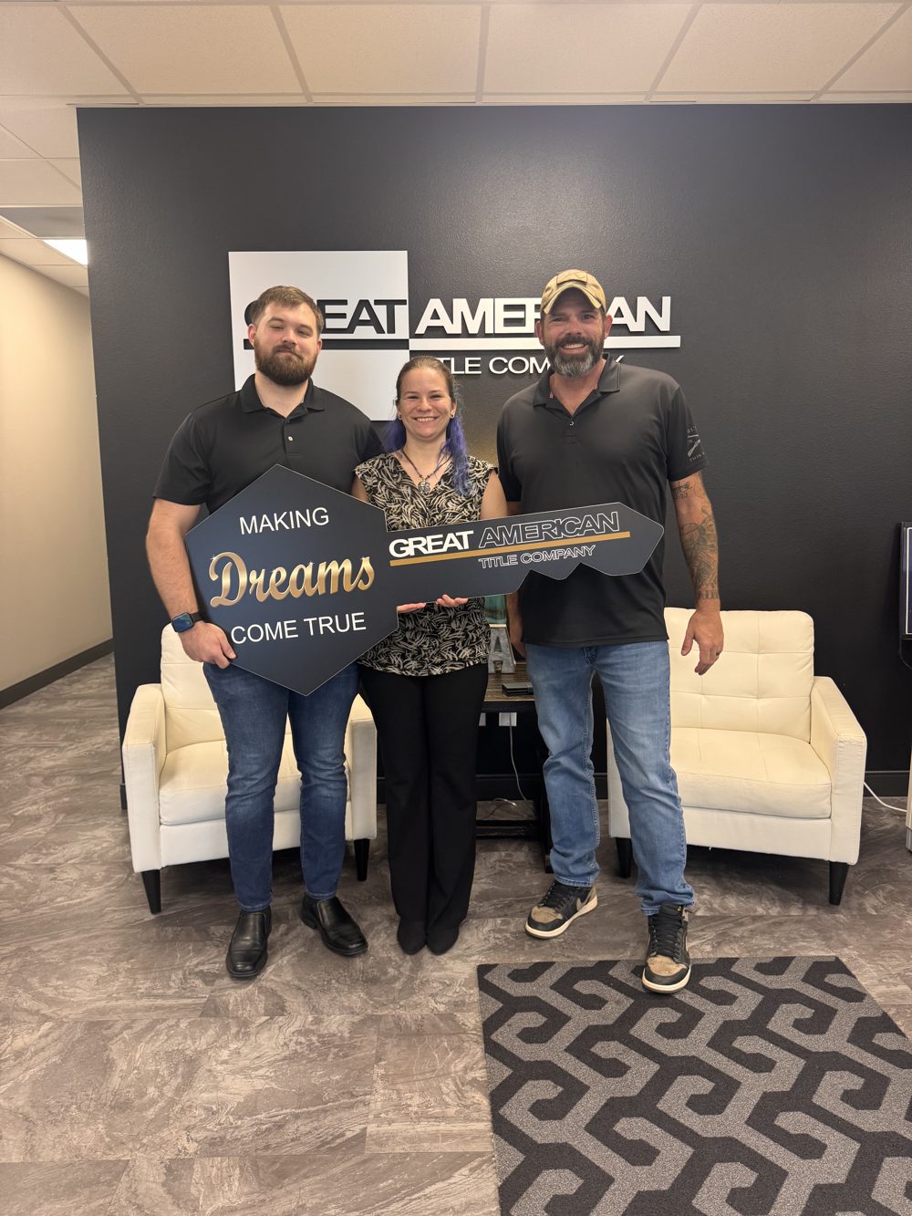 Justin and Rachel with REALTOR Brian Fisher on closing day