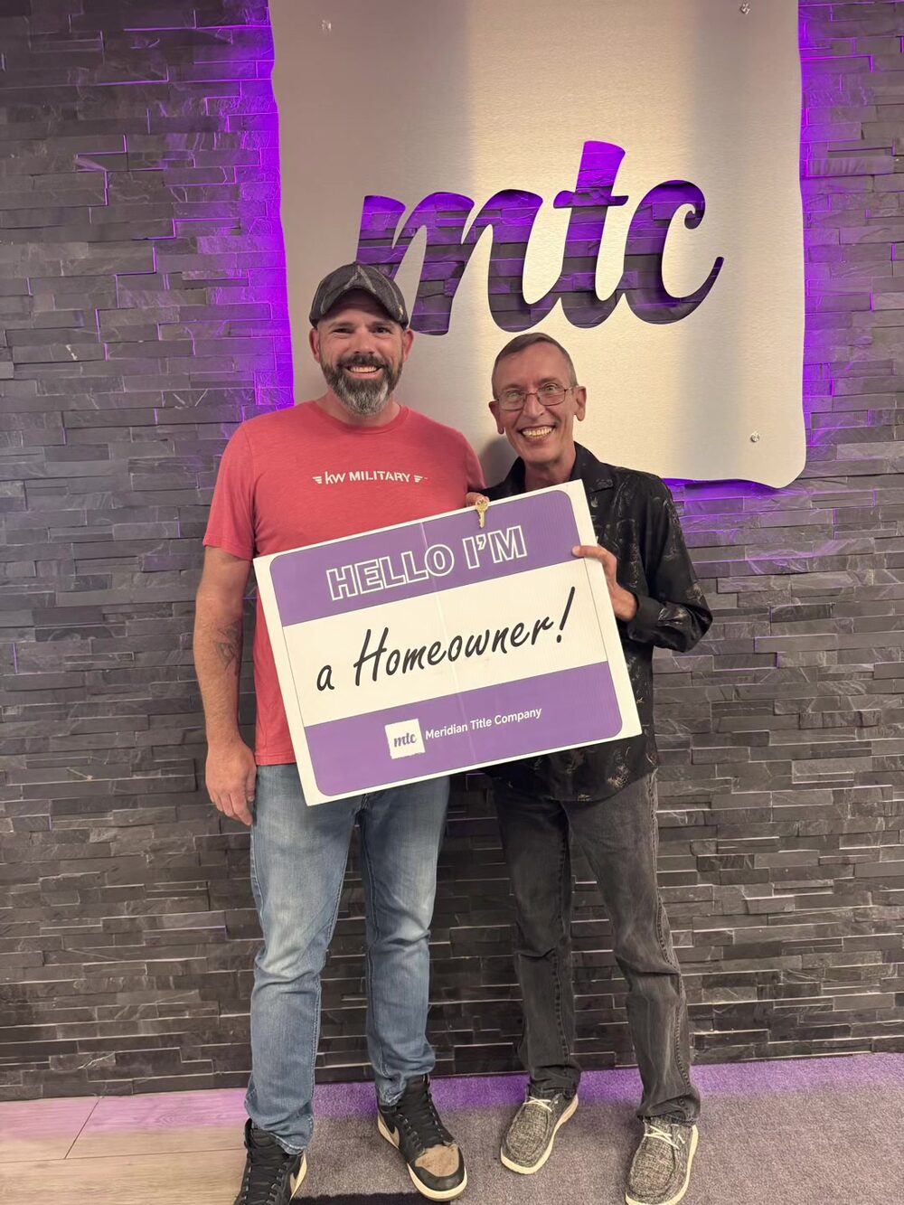 Shayne, U.S. Navy veteran, at closing on his home with Brian Fisher